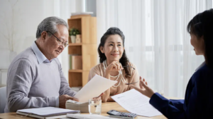 People at Table Discussing Estate Planning